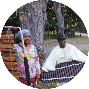 Balla Kouyaté and Matchume Zango pose with their instruments
