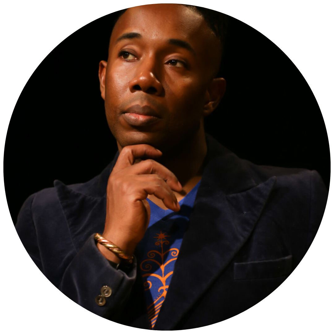 Jean Appolon in a circle frame in front of a black background. He is dark skinned. He looks off to the side and leans his chin on his hand.