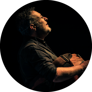 Nicolas Boulerice of Le Vent du Nord looks off into the distance.