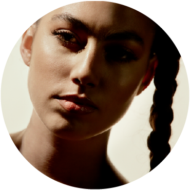 Close-cropped headshot of María José Llergo's face shadowed.