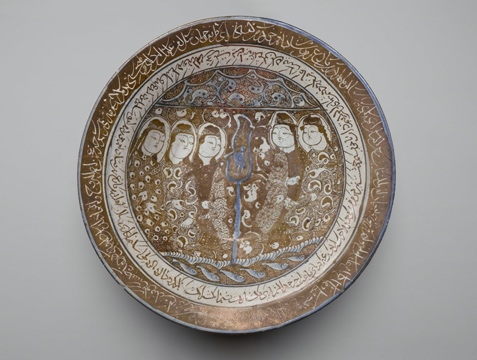 Brown, white, and gold bowl with figures and Arabic writing