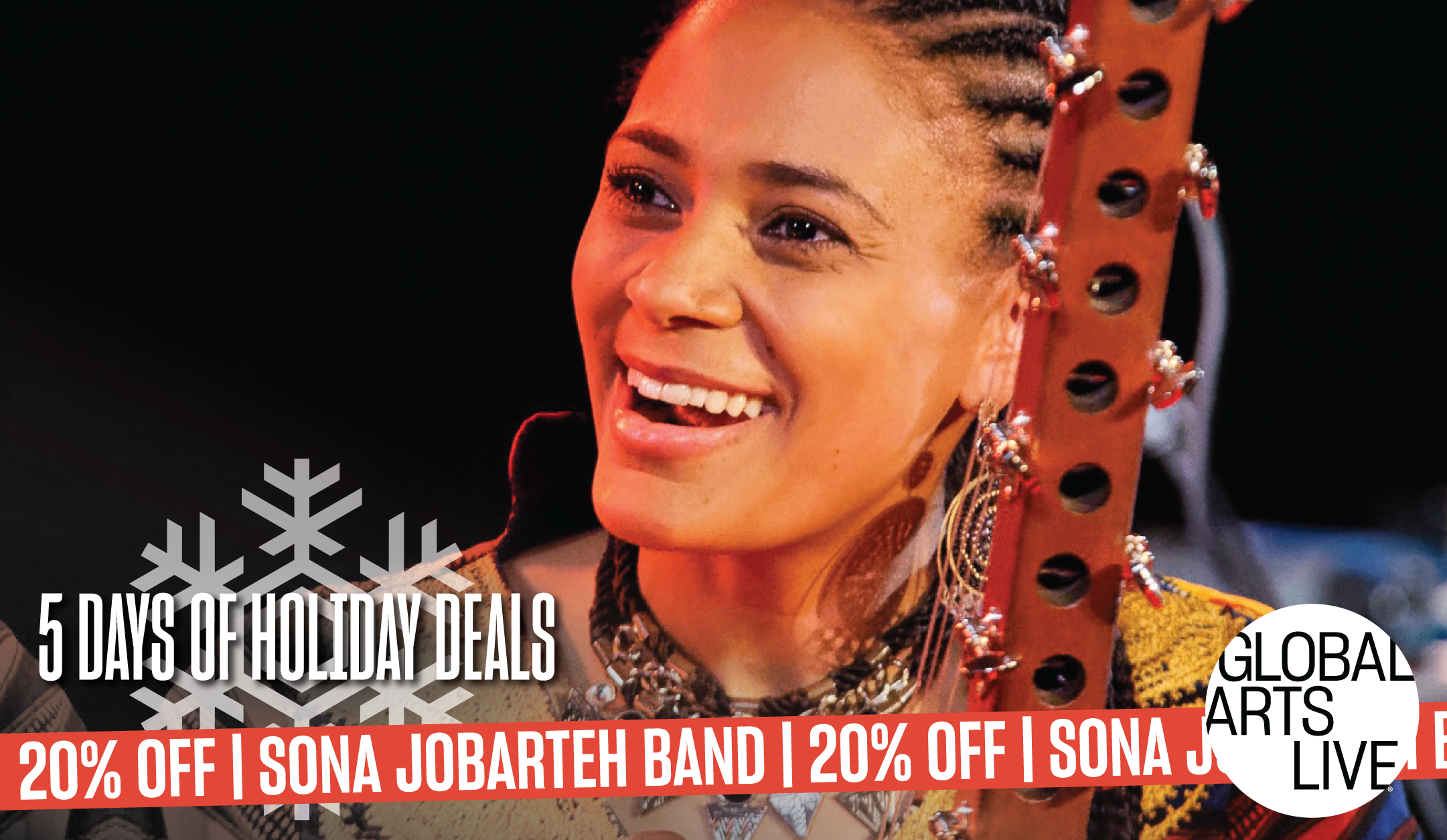 Sona Jobarteh holding a kora
