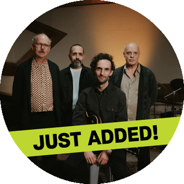 Julian Lage Quartet poses together with a 'just added' banner on top of image