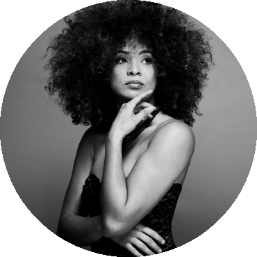 Kandace Springs posing in a black and white image