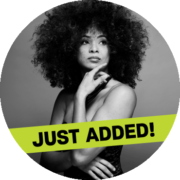 Kandace Springs posing in a black and white image with a "just added" banner