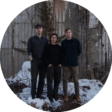 Members of Magic Tuber Stringband stand together