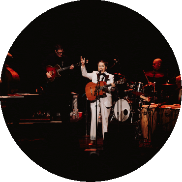Pink Martini performs on stage