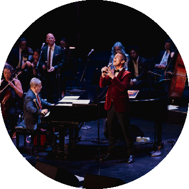 Pink Martini performs on stage