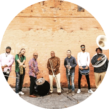 Rebirth Brass Band poses with their instruments