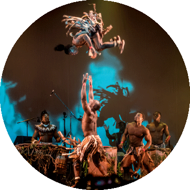 Dancer from Cirque Kalabanté is thrown in the air and flips