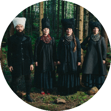 DakhaBrakha poses standing side by side in front of trees