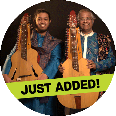 Debashish Bhattacharya and Suryadipta Bhattacharya smile and hold their instruments with 'just added' banner on top of image