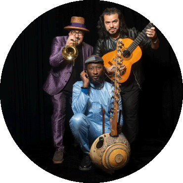 Flamenkora poses together with their instruments