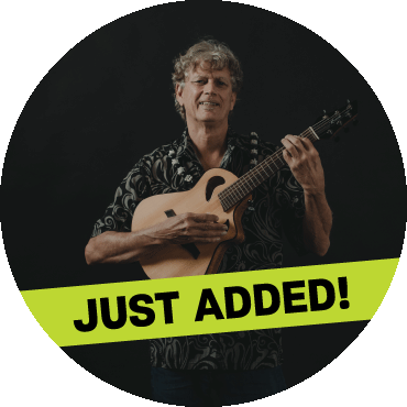 Jim Kimo West holding a guitar with a 'just added' banner on top of the image