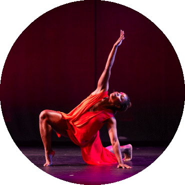 Dancer poses with their leg bent and arm up