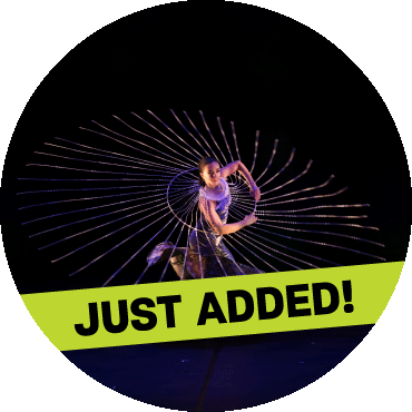 Dancer spins in circle with 'just added' banner on top of the image