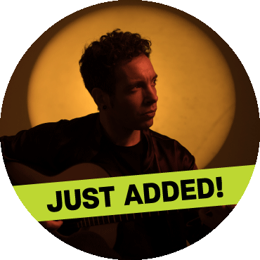 Pipo Romero holding a guitar and looking to the side with "just added" banner