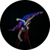 A dancer holds another dancer across their shoulder.