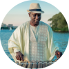 Balla Kouyate plays balafon against an ocean backdrop