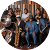 The Dirty Dozen Brass Band poses with their instruments