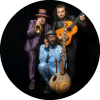 Flamenkora poses together with their instruments