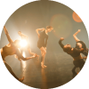 Dancers perform on stage