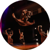 Dancer jumps while performing on stage