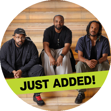 Sullivan Fortner Trio sits and poses on stairs with a 'just added' banner on image